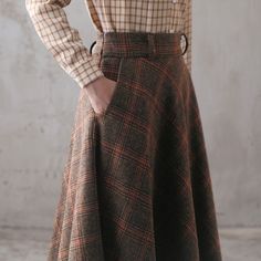 Retro A-line Winter Skirt, Fitted Wool Skirt With Pockets, Classic Full Skirt Bottoms For Fall, Fitted Winter Skirt With Pockets, Winter Skirt With Pockets, Classic Fall Midi Skirt, Classic Plaid Skirt For Fall, Vintage A-line Skirt For Fall, Wool Long Skirt For Fall