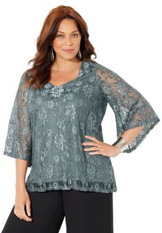 We love the delicate romantic lace that give this blouse its alluring elegance. Then there's the V-neckline, three-quarter length angel sleeves and the flowy drape that makes it so fitting to wear to your next soiree. FABRIC: Crisp, lightweight fabric with luxe metallic texture. FIT: Relaxed silhouette with effortless draping. V-neckline and three-quarter length angel sleeves. 70% Nylon/30% MetallicMachine washImported Plus Size BlouseAverage: 30" lengthPetite: 28" lengthPlus Sizes 0X-6X; Petite Elegant Blouse With 3/4 Lace Sleeves, Elegant Blouse With Lace Top And 3/4 Sleeves, Flowy Elegant Lace Tops, Elegant Flowy Lace Tops, Goddess Bras, Wedge Dress Shoes, Metallic Texture, High Waisted Swim Bottoms, Angel Sleeves