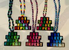 *Eat Sleep Rave Repeat Perler Necklace *Choose your colour *Necklace or no necklace options available  *Every order comes with a hand written note  *Enjoy USA BUYERS: Please note that the small packet shipping option has NO TRACKING. Pearlers Rave, Rave Perler Beads, Kandi Necklace Ideas, Trippy Perler, Edm Perler, Rave Perler, Rave Necklace, Perler Necklace, Perler Bead Designs