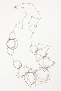 Long Shape Necklace by Meghan Patrice Riley. | Artful Home Modern Handmade Long Necklace, Handmade Artistic Necklace With Rectangular Shape, Artisan Long Metal Necklace, Luxury Contemporary Metal Necklaces, Unique Handmade Geometric Necklace, Abstract Necklace, Silver Gold Necklace, Abstract Jewelry, Steel Necklace