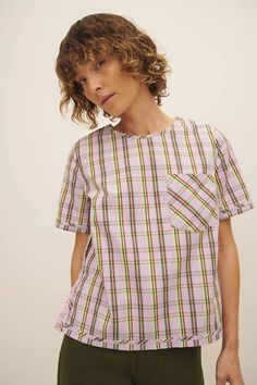 An elevated everyday top, made from 100% certified Fairtrade organic cotton poplin shirting in a joyful woven check. The Adrian Top has a standard fit with bust darts for gentle shaping and side splits for ease of wear. It features a binding detail at the cuffs and hem, and fastens with a button and loop at the back. This garment is completely plastic-free. Sizing: This style is true to size. We recommend taking your normal size. Pink Tartan, Garment Pattern, Denim Outerwear, Garment Labels, Side Splits, Denim Coat Jacket, Knitwear Tops, Mens Accessories Fashion, Denim Coat