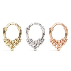 An Indian inspired septum ring with a dainty tribal design, this 8mm hoop is perfect for a timeless everyday look.The hoop features a durable clicker mechanism that makes it easy to insert and remove.Material:• 14k solid gold - available in yellow, rose and white gold • Closure type: clickerMeasurements:Inner diameter: 8mm - 5/16"Wire thickness: 1.2mm - 16g*Nickel- free Elegant Small Hoop Hypoallergenic Septum Ring, Elegant Hypoallergenic Small Hoop Septum Ring, Elegant Adjustable Hoop Septum Ring, Rose Gold Internally Threaded Hoop Septum Ring, Elegant Adjustable Small Hoop Septum Ring, Adjustable Internally Threaded Septum Ring, Adjustable Rose Gold Hoop Septum Ring, Hypoallergenic Rose Gold Hoop Septum Ring, Adjustable Small Hoop Septum Ring