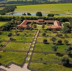 an aerial view of a large farm with lots of grass