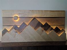 a wooden shelf with some lights on it