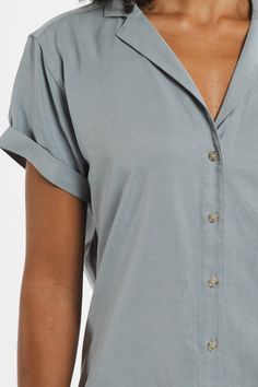 Flattering and versatile, meet your new go-to top The Innes is a short-sleeve button-up with a relaxed silhouette. Design details like a lapel collar and rolled sleeves mix modern design with a classic look. Just add a sweater and a great pair of pants or skirt, and this lightweight top is ready to be dressed up or down throughout the seasons. 90% Tencel, 10% Linen Relaxed fit button-up Lapel collar Short cuffed sleeves Machine wash cold, line dry only. Do not tumble dry, do not bleach. (Tag on American Express Credit Card, Rolled Sleeves, Lightweight Tops, Light Blue Color, Short Sleeve Button Up, Pair Of Pants, Silhouette Design, Lapel Collar, Cuff Sleeves