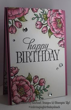 a birthday card with pink flowers on it