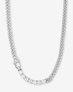 Chains + Diamonds = The Best of Both Worlds. Our best-selling Julian Cuban Chain Necklace becomes even more dazzling when simulated diamonds are added to the mix. Why? Because no one has ever been disappointed by adding diamonds.DETAILS: Cuban Chain Necklace Length: 18” Width: 6mm Signature MM Padlock Clasp SKU: N6361 White Cuban Link Necklace With Vvs Clarity, Silver Cuban Link Jewelry With Brilliant Cut, Diamond White Cubic Zirconia Chain Necklace For Anniversary, Cubic Zirconia Chain Necklace With Brilliant Cut For Anniversary, Cubic Zirconia Chain Necklace For Anniversary, Anniversary Diamond Cut Cubic Zirconia Chain Necklace, White Cubic Zirconia Chain Necklace, White Cuban Link Cubic Zirconia Necklace, Diamond White Sterling Silver Cuban Link Necklace