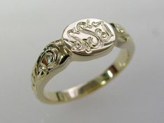 This beautiful Hand Engraved Woman's signet monogram ring measures 9mm by 7.5 mm where the monogram goes and can be made in any size needed. The hand engraved cuts are bright as well as nice and deep and will not wear off like machine engraving.  The shoulders are embellished with my vine and leaf pattern about half way down on each side. Shown in 14k yellow gold in a size 6, this ring weighs approximately 5 grams and has a very nice thickness and feel to it. I can make this ring in any of the f Hand Engraved Wedding Band, Wedding Band Engraving, Monogram Ring, Anniversary Bands, Engraved Rings, Hand Engraving, Custom Rings, Leaf Pattern, Beautiful Hand