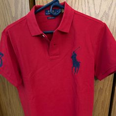 Brand New, Tags Removed , Unworn, Unused. Classic Red Fitted T-shirt, Classic Fitted Red T-shirt, Fitted Red Ralph Lauren Tops, Red Fitted Ralph Lauren Tops, Classic Red Ralph Lauren Top, Red Fitted Short Sleeve Polo Shirt, Red Ralph Lauren Collared Shirt, Red Collared Ralph Lauren Shirt, Ralph Lauren Red Collared Shirt