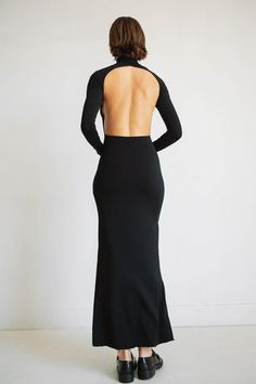 Sleek Stretch Backless Maxi Dress, Stretch Maxi Dress With Low Back For Evening, Sleek Stretch Maxi Dress With Flattering Silhouette, Backless Elastane Dress With Back Zipper, Backless Dress With Back Zipper In Elastane, Stretch High Neck Backless Dress For Evening, Fitted Maxi Dress With Back Opening For Date Night, Fitted Maxi Dress With Cowl Back For Night Out, Stretch Maxi Dress With Low Back