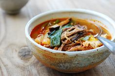 a close up of a bowl of food on a table