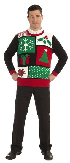 a man wearing an ugly christmas sweater and black pants with his hands on his hips