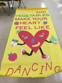 a yellow banner with an image of a heart on it and words that read, vegetables and vegetables make your heart feel like dancing