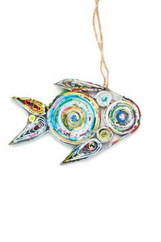 a colorful fish ornament hanging from a string