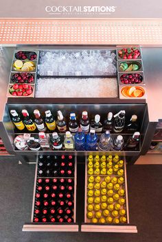 a cooler filled with lots of different types of drinks