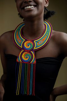 Unique Africa Maasai Handcrafted Leather Beaded Necklace with an Elegant Look and Brilliant Finish. Color = Multi-Color. Length (Around Neck) =Adjustable. Length ( Downwards ) = 14 Inches / 37 Centimeters. **GET FREE SHIPPING FOR ADDITIONAL ITEMS PURCHASED. Yes, Buy Multiple Items and pay shipping for 1 item only- The rest ships Free. (No Limits on the number of Multiple items). With a faster delivery time of 3 days via DHLExpress, Worldwide. Ordinary/Standard Shipping also available upon reques Handmade Multicolor Beaded Necklaces, Artisan Multicolor Jewelry With Black Beads, Unique Multicolor Fashion Necklaces, Handmade Multicolor Beads Fashion Accessory, Handmade Multicolor Beads For Fashion, African Jewelry Necklaces Africa, African Gold Necklace, African Collar Necklace, African Statement Necklace