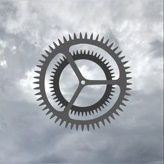 an image of a clock face in the sky