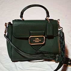 Coach Leather Crossbody With Two Handles For Versatility. Inside Zipper Pocket And Slip Pocket. Gold Hardware. Coach Crossbody Satchel With Adjustable Strap, Coach Top Handle Satchel With Adjustable Strap, Formal Green Coach Bag, Coach Green Shoulder Bag For Formal Occasions, Green Coach Shoulder Bag For Formal Occasions, Elegant Green Coach Satchel, Formal Green Coach Shoulder Bag, Coach Green Bag With Gold-tone Hardware, Green Coach Top Handle Shoulder Bag