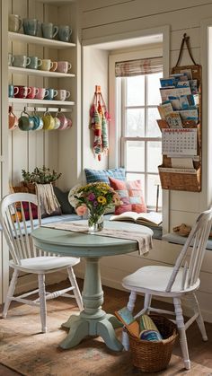 a table and chairs in a small room