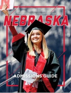 a woman in graduation cap and gown holding her hand up with the words nebraska on it