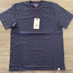 Best Made Co Standard Pocket-Tee , T-Shirt Navy Measurements: M- 20.5in W / 27in L L- 22in W / 28in L Made In Peru 100% Cotton Navy Crew Neck T-shirt For Summer, Classic Blue T-shirt For Streetwear, Classic Blue Crew Neck T-shirt, Navy Relaxed Fit Short Sleeve T-shirt, Blue Crew Neck T-shirt With Pockets, Navy Pre-shrunk Cotton T-shirt, Navy Cotton T-shirt For Everyday, Basic Navy Short Sleeve T-shirt, Basic Short Sleeve T-shirt With Pockets