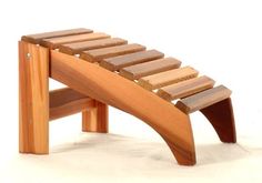 a wooden bench that is made out of wood