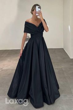 This elegant evening dress features an A line silhouette, off shoulder neckline, and ruched detailing. Perfect for formal occasions, this dress will flatter your figure and make you stand out. Crafted with high-quality materials, it is comfortable and timeless. Black One Shoulder Gown, Elegant Dresses Off Shoulder, Party Gowns Evening Dresses Elegant, Black Prom Dress Outfit Ideas, Long Black Elegant Dress, Off Shoulder Gown Evening Dresses, Black Engagement Dress, Black Satin Long Dress, A Line Silhouette Dress