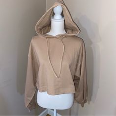 Summer Tan Cropped Style Puffy Sleeve Hoodie Sweatshirt Comes In Size Small, Medium, Large, And X-Large 100% Cotton Basic Oversized Hoodie For Spring, Basic Hooded Tops For Winter, Beige Hoodie Top For Loungewear, Hooded Beige Tops For Winter, Basic Winter Hoodie Tops, Cream Hooded Tops With Relaxed Fit, Comfy Fall Tops With Drawstring Hood, Trendy Hooded Top With Cozy Fit, Beige Hooded Top For Loungewear