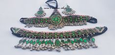 This Necklace set is widely used in Afghan Kuchi tribe which has beautiful matching earing, Matha Patti and necklace. Necklace and earing have hanging chains with anklets balls and colorful gems which makes it more attractive and sharp. Traditional Handmade Metal Jewelry Set, Handmade Traditional Metal Jewelry Sets, Bohemian Metal Jewelry Sets For Festivals, Traditional Dangle Jewelry Set For Party, Handmade Temple Jewelry Sets For Party, Handmade Festive Dangle Jewelry Sets, Traditional Dangling Beads Jewelry For Party, Traditional Party Jewelry With Dangling Beads, Bohemian Style Stone Work Necklaces For Party