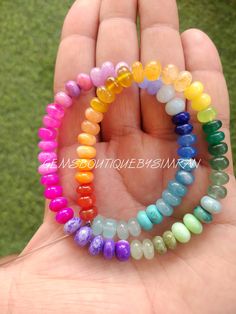 Listing is for Rainbow Color Multi Gemstone Smooth Rondelle Beads Stones :: Chalcedony, Turquoise, Candy Opals, Quartz, Lapis, Prehnites Size  :: 7.5-8mm approx Shape  :: smooth rondelles Sold As  :: 1 line of 16 inches Drill hole  :: 0.50mm Closure :: Normal Strand/ Sterling silver clasp (CHOOSE VARIATIONS) FOR MORE BEAUTIFUL GEMSTONE U MAY VISIT MY ETSY STORE :: https://www.etsy.com/in-en/shop/GemsBoutiqueBySimran?ref=shop-header-name&listing_id=1763358423&from_page=listing&search_query=Multi+ Rainbow Natural Stones Beaded Bracelets For Jewelry Making, Rainbow Gemstone Beaded Necklaces, Rainbow Beaded Necklaces With Gemstone Beads, Rainbow Beaded Necklaces With Natural Stones, Rainbow Round Beads Gemstones For Gift, Rainbow Gemstone Beaded Necklace With Round Beads, Multicolor Natural Stone Beads And Cabochons, Rainbow Gemstone Beaded Bracelets, Rainbow Gemstone Beads For Jewelry Making