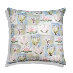 a decorative pillow with colorful flowers on it