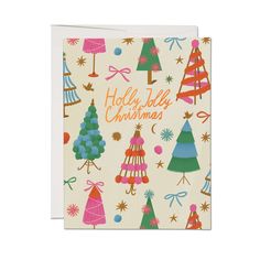 a holiday card with colorful christmas trees and bows on the front, which reads holly jolly christmas