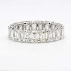 Ninacci Platinum Eternity Band with 5.81 Carats Emerald Cut Diamonds - Size 4.5 Timeless Diamond White Emerald Cut Eternity Band, Classic White Gold Eternity Band With Radiant Cut, Classic White Gold Radiant Cut Eternity Band, Elegant Asscher Cut Eternity Band With Vvs Clarity, Elegant White Gold Asscher Cut Eternity Band, Elegant White Emerald Cut Eternity Band, White Asscher Cut Elegant Eternity Band, Luxury White Gold Eternity Band With Halo Design, Elegant Eternity Band With Baguette Cut Lab Grown Diamonds