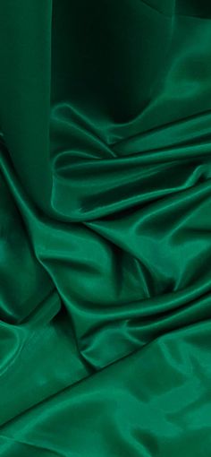 the green fabric is very soft and shiny