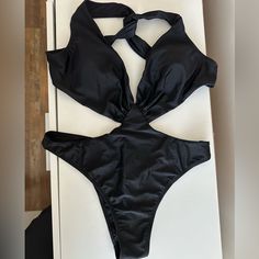 Never Worn But Missing Tags. Black One-Piece Cut-Out Swimsuit From Shein - Size L Black Bodysuit With Lined Body For Vacation, Black Lined Bodysuit For Vacation, Black Stretch One Piece For Party, Black Stretch One-piece For Party, Black Backless One Piece For Beach Season, Black Lined Bodysuit For Pool, Black Lined Bodysuit For The Pool, Black Pool Bodysuit With Lined Body, Black Halter Neck Bodysuit For The Beach