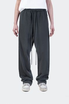 Relaxed Fit Sweatpants, part of IDLT's Autumn/Winter '24 collection, offer comfort and style in washed gray, black, coffee, white, and ash. Made from 100% cotton with a fabric weight of 400 gsm, these sweatpants feature an oversized, unisex fit. Easy care with machine or hand wash under 40°C, no bleach, and low-temperature ironing reversed. Lay flat to dry. Size Chart: Size Waist (cm) Hip (cm) Length (cm) Hem (cm) S 66-75 102 104 21 M 70-79 106 106 22 L 74-83 110 108 23 XL 78-87 114 110 24 Washed Black Cotton Long Bottoms, Urban Style Gray Winter Bottoms, Urban Gray Winter Bottoms, Washed Black Pants For Winter Streetwear, Gray Baggy Winter Bottoms, Washed Black Loungewear Pants With Pockets, Baggy Washed Black Pants For Winter, Relaxed Fit Washed Black Winter Bottoms, Relaxed Fit Washed Black Pants For Winter