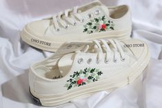 Custom wedding converse/Bridal flower embroidered shoes/Custom converse low tops embroidered flower /Wedding flower embroidered sneakers  💸 Price includes Converse Shoes and floral embroidery as shown 🌸 You can send me your Converse/Vans shoes or I can buy them for you. We stock all the Converse and Vans shoes you want, if you want other Converse/Vans shoes in the store, please message us. Your embroidered Converse/Vans shoes will be available for shipping in 7-15 days. 🌸 I started hand embroidering on fashionable clothes and handbags over 20 years ago - and now on CONVERSE/VANS shoes, an American icon, a must-see classic! I'm excited to give your Chuck Taylor shoes a new look with beautiful, nature-inspired embroidery. All images, designs and text used by CUSTOMSHOEDESIGNSOHO are copyr Wedding Converse Clogs & Mules, Embroidered Sneakers, Chuck Taylor Shoes, Embroidered Converse, Black High Top Converse, Converse Low, Wedding Converse, Converse Low Tops, Wedding Embroidery