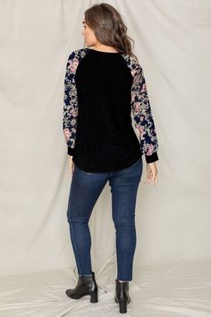 95% Polyester 5% Spandex Made in the USA Raglan floral sleeve with contrast cuff, v-stitch accent SIZE: (Fits true to size in relaxed) || 1X(18), 2X(20), 3X(22) 1X: Bust 46" Length 30.5" 2X: Bust 48" Length 31" 3X: Bust 50" Length 31.5" Long Sleeve Tops With Contrast Sleeves For Fall, Fall Long Sleeve Tops With Contrast Sleeves, Black Tops With Embroidered Sleeves For Fall, Spring Tops With Contrast Long Sleeves, Long Sleeve Tops With Contrast Sleeves For Spring, Spring Tops With Contrast Sleeves And Long Sleeve, Floral Print Tops For Fall Loungewear, Floral Print Loungewear Tops For Fall, Spring Top With Long Contrast Sleeves