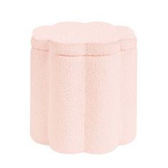 a pink stool that is sitting on a white surface and it has a circular shape