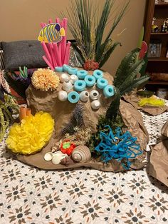 a table topped with lots of different types of decorations on top of paper towels and plates