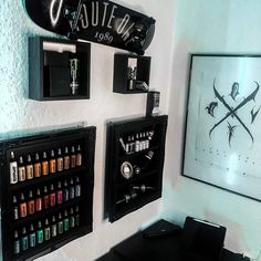 the wall is decorated with different types of nail varnishs and other art supplies