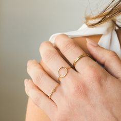 Wear our Karma Circle Ring as a daily reminder to always choose kindness. The Karma Circle Ring symbolizes the saying “what goes around comes around”. This ring is the perfect meaningful gift for a loved one. We love it paired with our Twist Ring & our Dot Ring. DETAILS Gold filled -or- sterling silver ring with 10mm circle Available in sizes 5-9 Please note: there may be visible solder marks for gold - this is normal and just adds to the uniqueness of your piece! Matching jewelry: Karma Circle Square Karma Ring, Hand Rings Simple, Ring For Daily Wear, Antique Gold Rings Unique, Dreamy Jewelry, Gold Circle Ring, Karma Jewelry, Antique Gold Rings, Choose Kindness