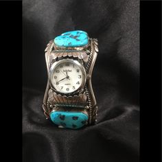 This Is A Beautiful Men's Turquoise Watch Cuff By Marianne Spencer Of Gallup Nm. We Personally Met With Marianne To Purchase This Watch. This Watch Has 4 Large Gemstones That Have Magnificent Color And Is Sterling Silver And Weights Approx. 87.5 Gr. The Inner Measurement Is 5 2/4” With A 1 1/2” Gap. Please Note That I Have Already Reduced Most Items From Their Original Selling Price And Because Most Of My Listings, Unless Otherwise Stated, Are New Never Worn, I Can Not Reduce Them Much More. Tha Turquoise Quartz Watch For Gifts, Silver Collectible Watches With Subdials, Collectible Silver Watch With Subdials, Collectible Silver Chronograph Watch, Silver Analog Display Watch, Silver Analog Display Watches For Collectors, Silver Analog Display Watch For Collectors, Cuff Bracelet Strap Watches, Cuff Watch