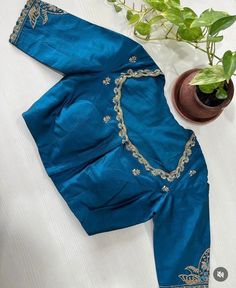 Hand embroidered ready made saree blouse / crop top/stitched saree blouse usa / saree blouse/modern blouse/zardosi blouse/blue saree blouse/ pure silk blouse/ maggam work blouse / white blouse        It is very true that a perfect blouse is the one which makes your saree look stand out !! If you find one of such a style that you have been wanting to have then dont let it go !! we carry such unique trending blouses that instantly add a stylish look to any saree !!     Well..!! we understand that you may not get in your desired size/pattern, here you go with customization according to your size/pattern which we can deliver in 1-2 weeks of time period !!      Here is a beautiful Hand embroidered saree blouse/ crop top  in sea green color that has embossed multi embroidery on sleeves and neck Fitted Blue Dola Silk Choli, Blue Chanderi Blouse With Resham Embroidery, Blue Art Silk Choli With Floral Embroidery, Blue Handwork Saree For Festive Occasions, Blue Embroidered Unstitched Top For Wedding, Festive Blue Handwork Saree, Blue Handwork Saree, Blue Handwork Saree For Wedding, Designer Blue Blouse With Floral Embroidery