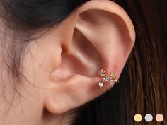 Available in 3 colours ✦ 18k gold plated ✦ Rhodium plated ✦ 18k rose gold plated Quality & Detail ✦ Ear cuff : Your ears don't have to be pierced to wear this product. ✦ Fits any ear as it is adjustable. ✦ Semi-precious gemstones : Rose quartz, Citrine ✦ The height 10.1mm ✦ The width 11mm ✦ Cubic zirconia size 2.5mm ✦ Bigger Flower size 7mm ✦ Smaller Flower size 4.2mm ✦ Tiny butterfly size 2.3mm ✦ Sold individually : Comes in a cute little package ready for gifting Shipping from United Kingdom Dainty Gold-plated Ear Cuff, Rose Gold Pierced Ear Cuff As Gift, Elegant Flower Shaped Ear Cuff As Gift, Dainty Rose Gold Ear Cuff, Delicate Hypoallergenic Ear Cuff For Gifts, Hypoallergenic Rose Gold Ear Cuff Gift, Butterfly Cute, Tiny Butterfly, Wrap Earrings