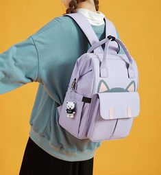 Lovely Cat Ears Backpack PN6094 ●Size:40*27*17 cm.●Material: polyester (Please allow 1-3cm differs due to manual measurement.As different computers display colors differently,the color of the actual may vary slightly from the above images.Thanks for your understanding.) ●About Shipping: We attach great importance to the orders of each customer and parcel delivery. 1.Processing time: 2-3 business days. 2.Shipping time: 10-15 business days to US, please allow 3-4 weeks shipping to other country.(Shipping times can be affected by variable customs clearance times or public holidays.) Casual Cat Design Backpack For Daily Use, Student Backpack With Cat Design, Trendy School Backpack With Cat Design, Travel Backpack With Cat Design, Trendy Cat Design Backpack For Daily Use, Cat Design Travel Bag For Back To School, Rectangular Cat Design Backpack For Back To School, Travel Bag With Cat Design For Back To School, Rectangular Backpack With Cat Design For Back To School