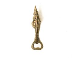 an antique brass door handle on a white background