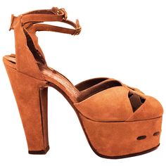 1940's Brown Suede Platform Measures 9 inches from toe to heel. Platform is 2inches high, heel is 5 inches long. Palm of foot measures 3 inches wide. Vintage Pointed Toe Platform Heels, Vintage Platform Heels With Pointed Toe, Vintage Ankle Strap Heels With 4-inch Heel, Vintage Platform Heels With Ankle Strap, Vintage Ankle Strap Platform Heels, Vintage Platform High Heels, Vintage High Heel Platform Heels, Vintage Heels With Reinforced Heel For Evening, Vintage High Heels With 4-inch Heel