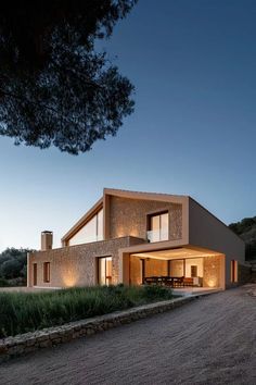 a modern house in the countryside at night