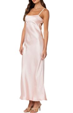 Slinky satin adds to the elegance of a classic sheath with a sultry open back. Back hook-and-eye closure Adjustable straps Straight neck 100% polyester Machine wash, dry flat Imported Fitted Satin Slip Dress With Back Opening, Pink Backless Slip Dress For Date Night, Glamorous Fitted Satin Finish Slip Dress, Fitted Glamorous Satin Finish Slip Dress, Glamorous Satin Finish Backless Slip Dress, Glamorous Satin Backless Slip Dress, Pink Backless Bias Cut Dress, Pink Satin Finish Slip Dress For Formal Occasions, Fitted Satin Sheath Slip Dress